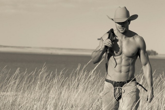 shirtless-sexy-cowboy-walking-in-a-field-in-New-Mexico